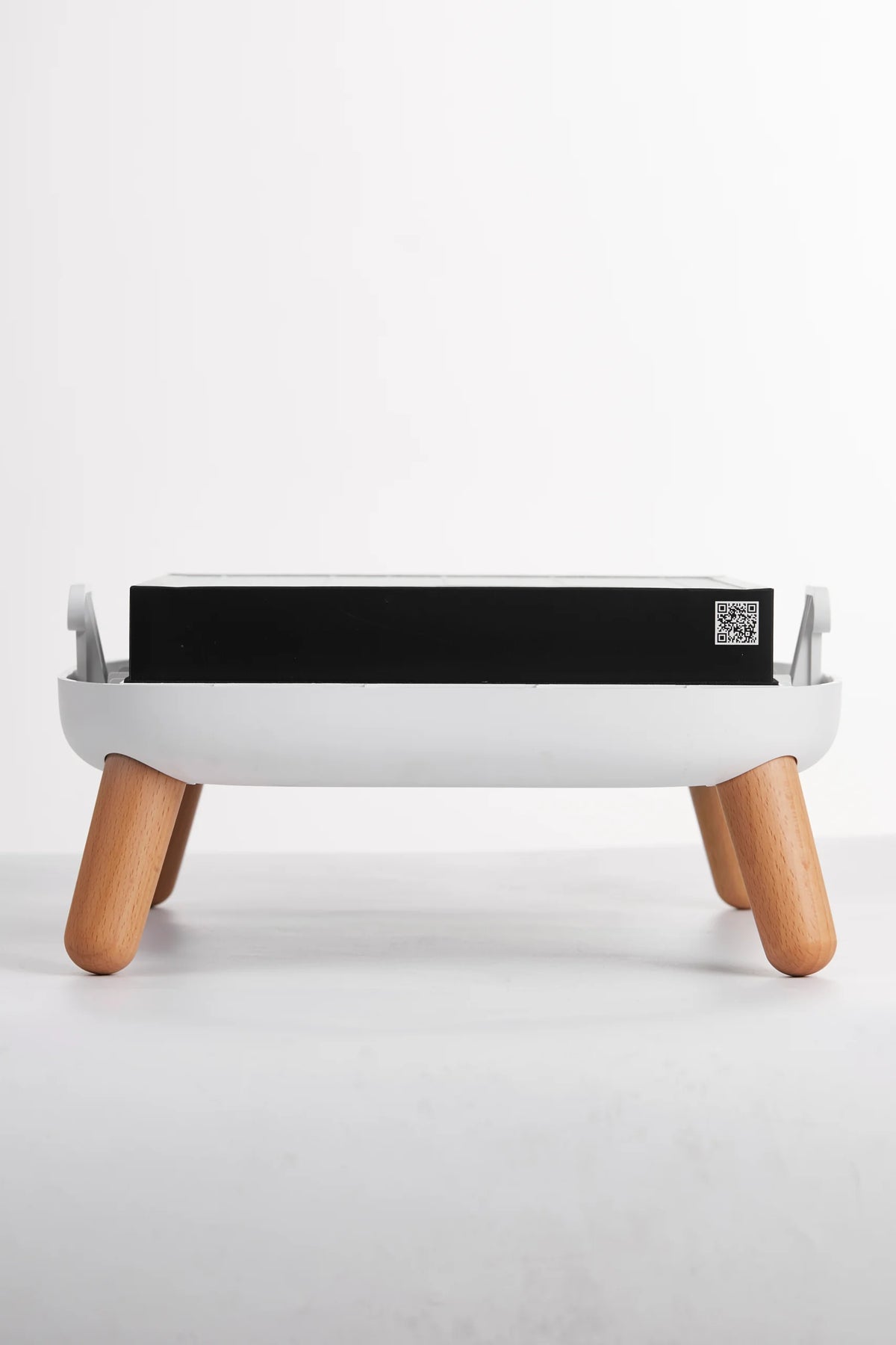 Smart Air Sqair HEPA E12 air purifier — angled view on wooden legs
